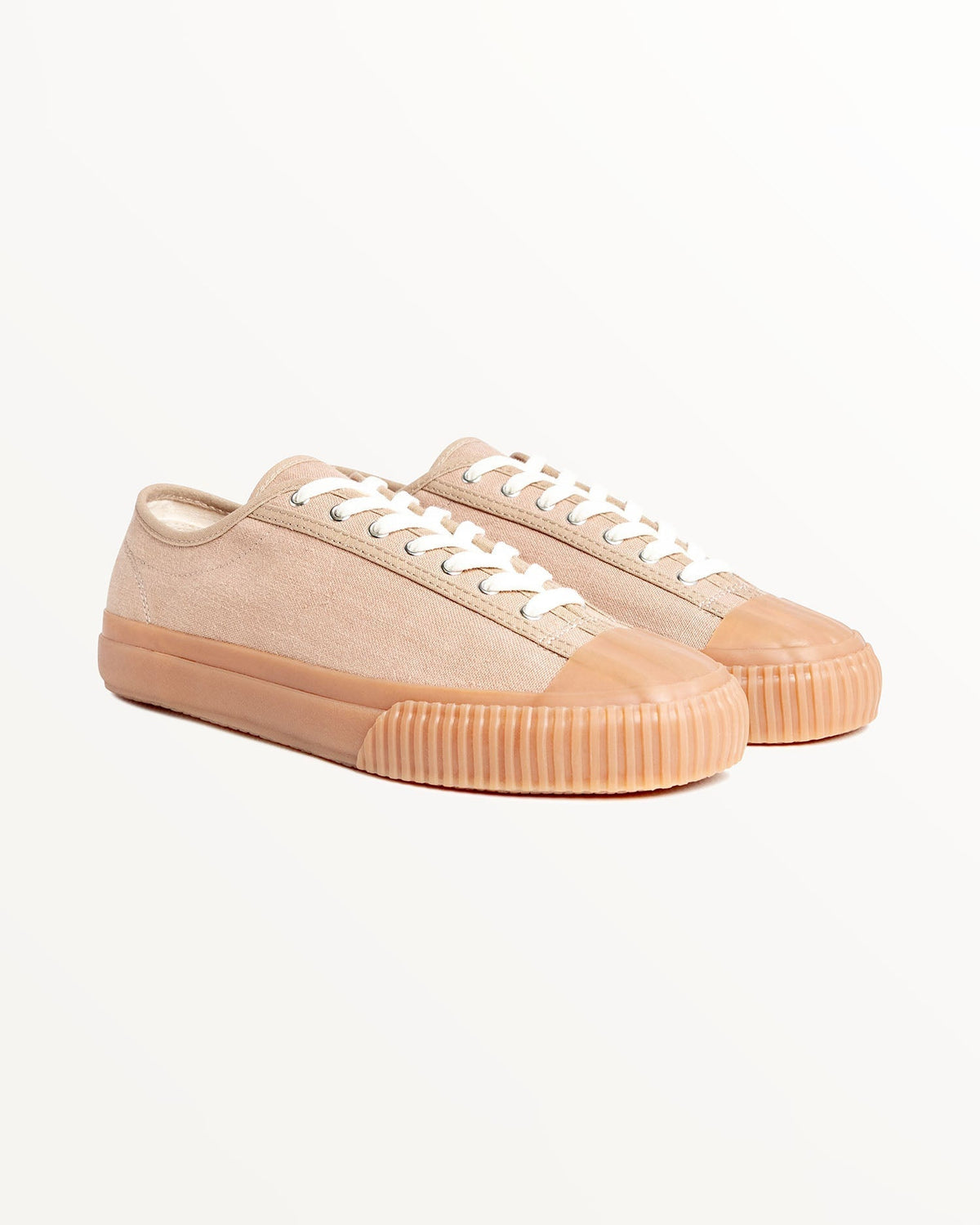 Pair of CC x Original Fibres Greige trainers, three-quarter front view