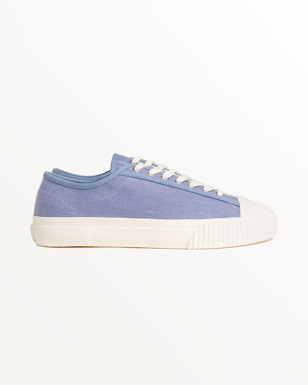 CC x Original Fibres Stonewash trainer, side view with washed blue hemp canvas and off-white rubber sole