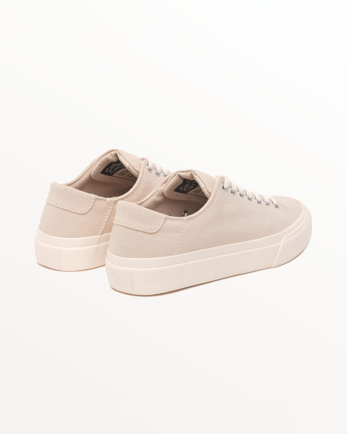Baan Natural trainers, three-quarter rear view showing canvas heel