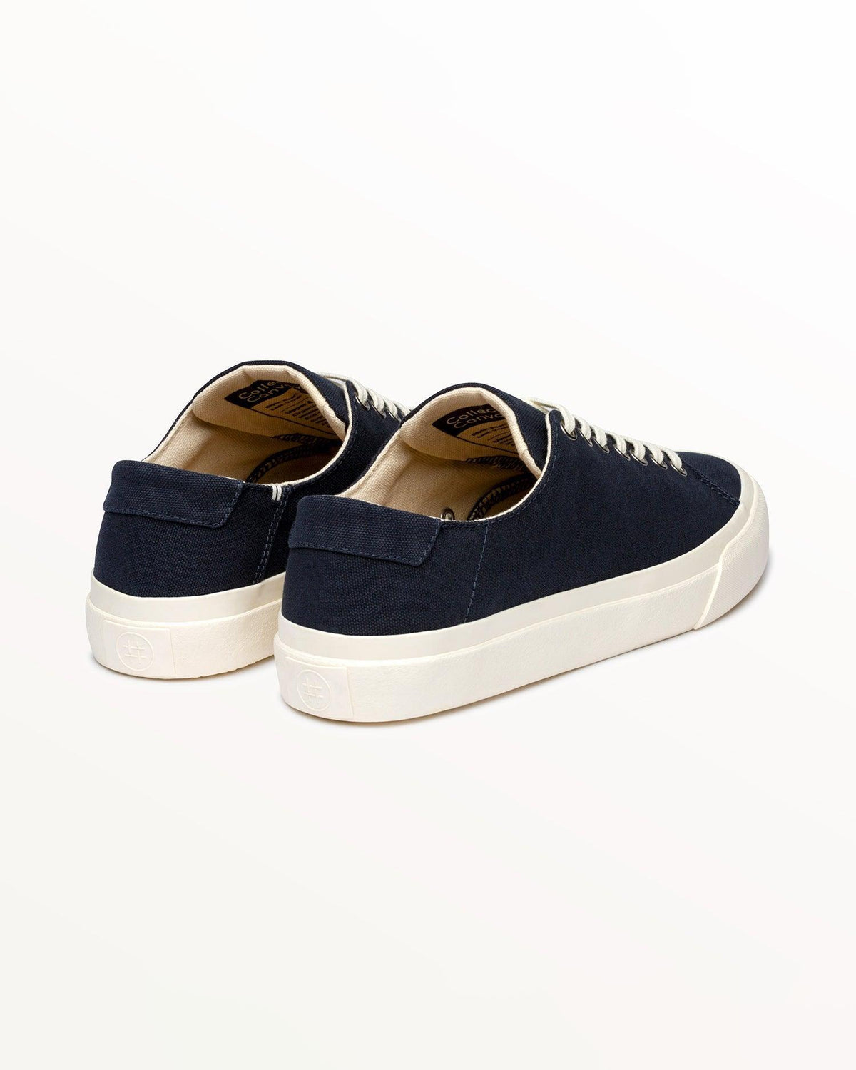 Baan Navy trainers, three-quarter rear view with off-white rubber sole