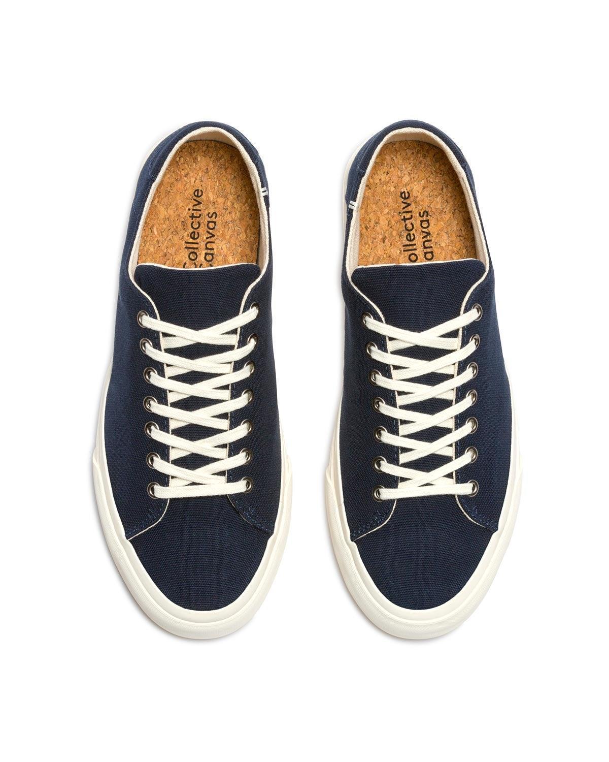 Baan Navy trainers, top view showing cork insoles and cream laces
