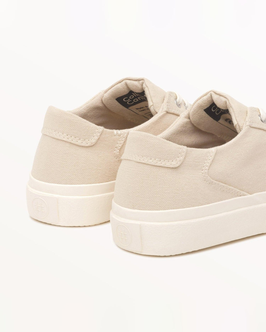 Close-up of Bal Natural heel with pull tab, branded insole label and embossed logo on the off-white rubber sole