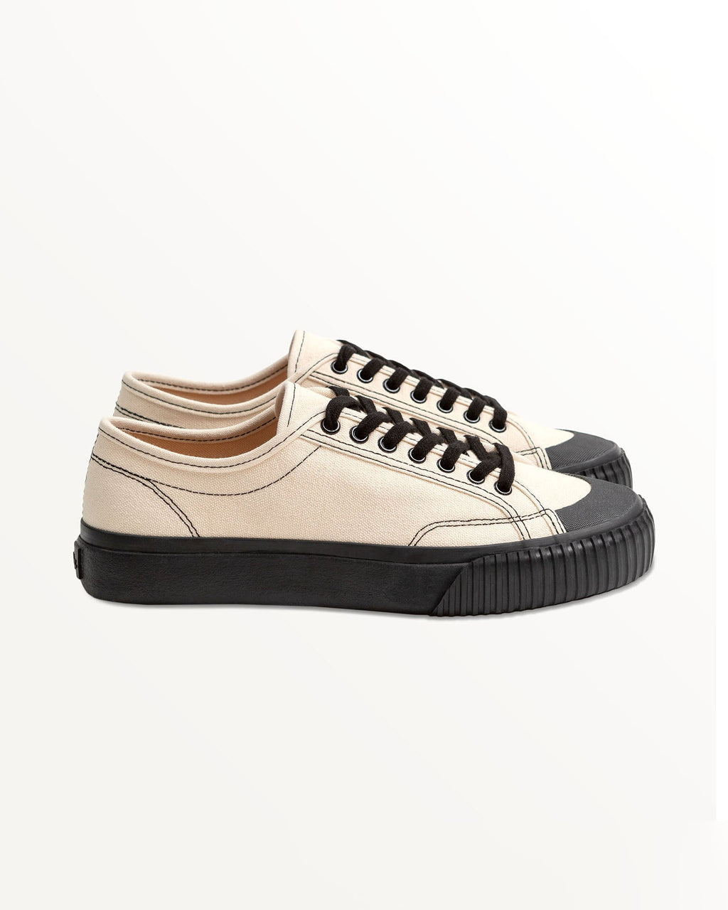 Buddy x CC Hemp Off-White/Black trainer, side view with black stitching and black rubber sole