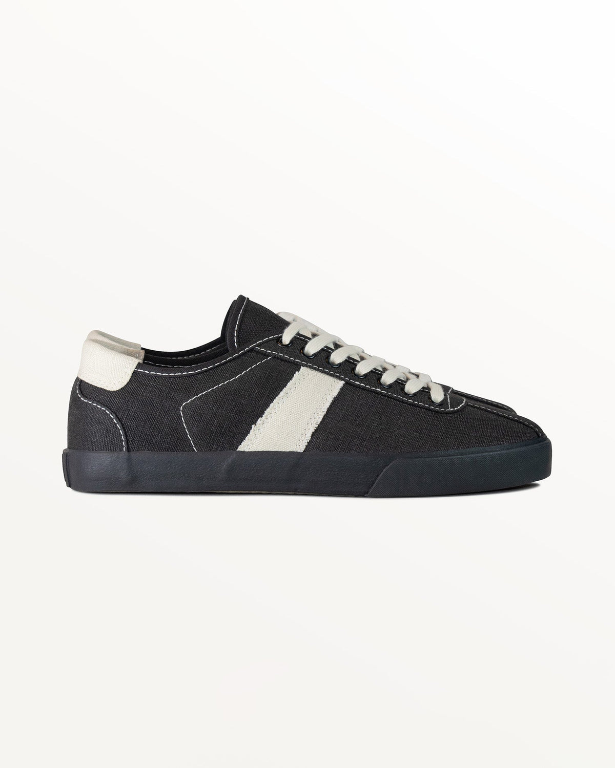 Looper Hemp Black/White Stitch trainer, side view with ecru stripe, ecru heel tab and black rubber sole