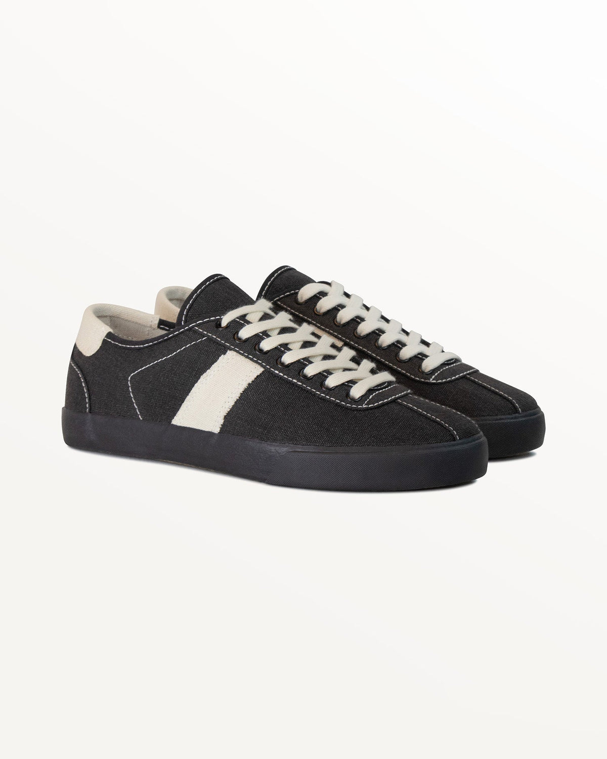 Pair of Looper Hemp Black/White Stitch trainers, three-quarter front view