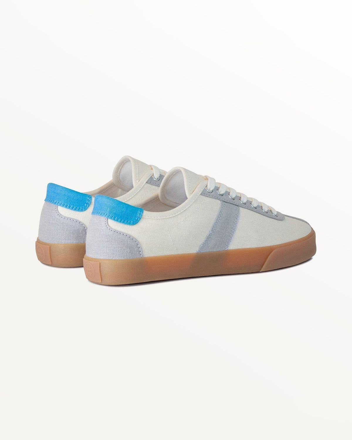 Looper Hemp Ecru/Grey trainers, three-quarter rear view showing blue heel tabs and grey heel panels