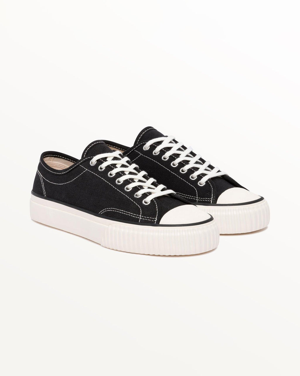 Pair of Straat Hemp Black/White trainers, three-quarter front view