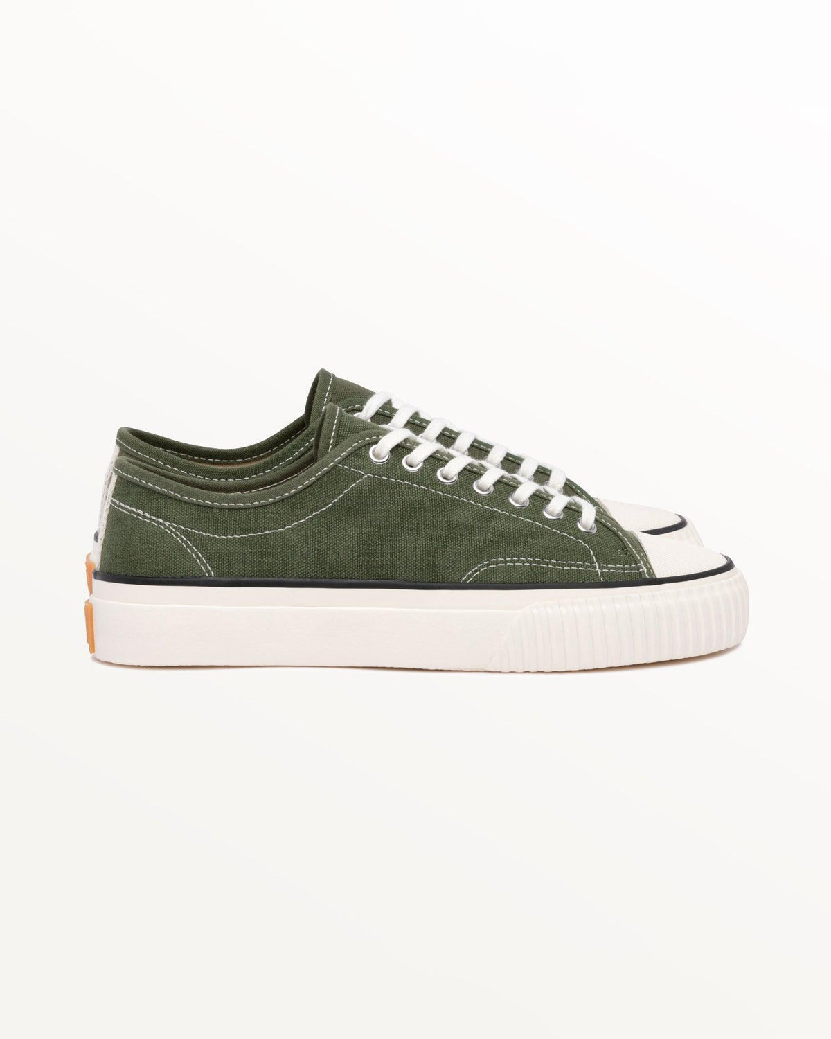 Straat Hemp Olive trainer, side view with black stripe and off-white rubber sole