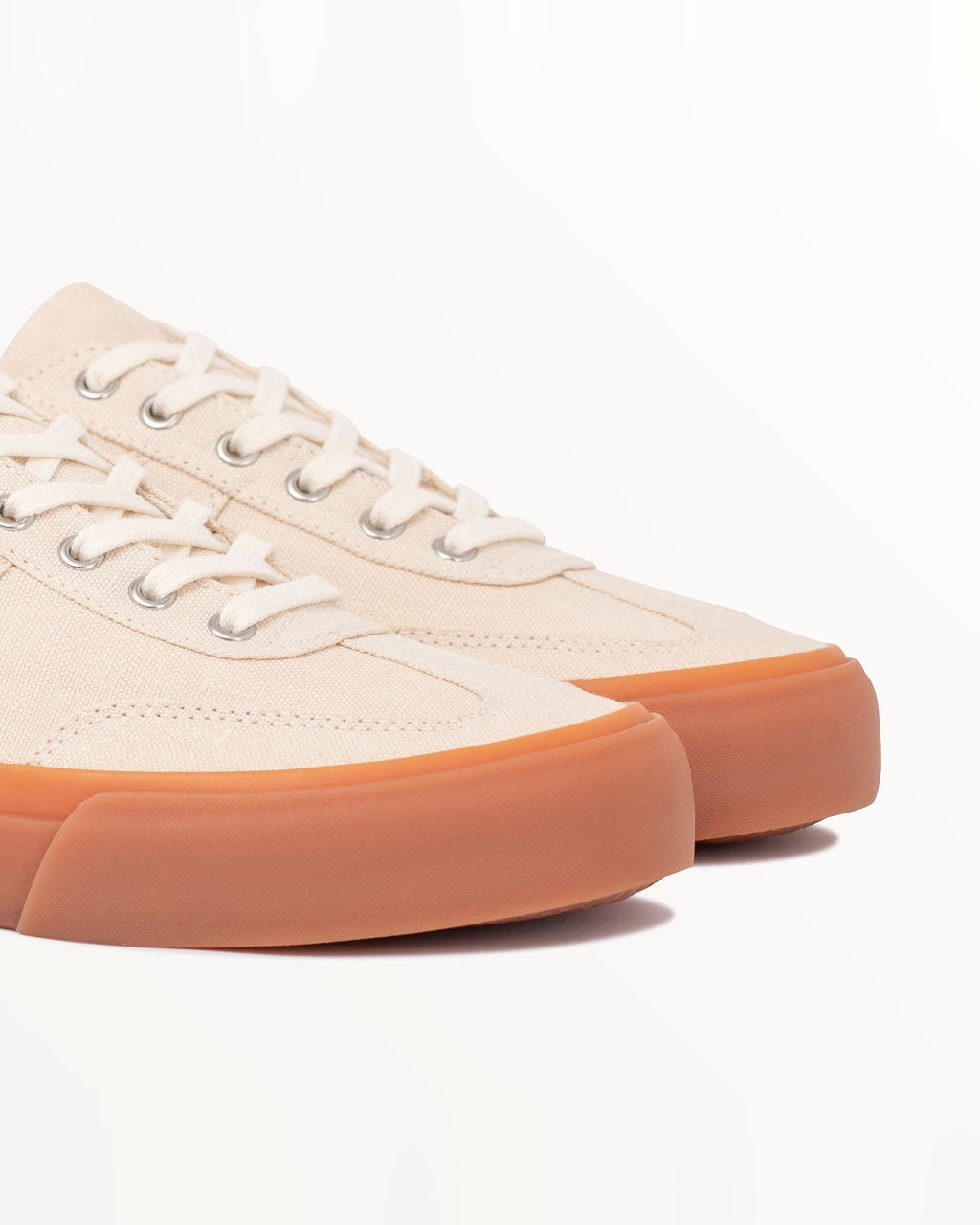 Close-up of ecru hemp canvas upper, laces and metal eyelets on Veld Ecru/Sage